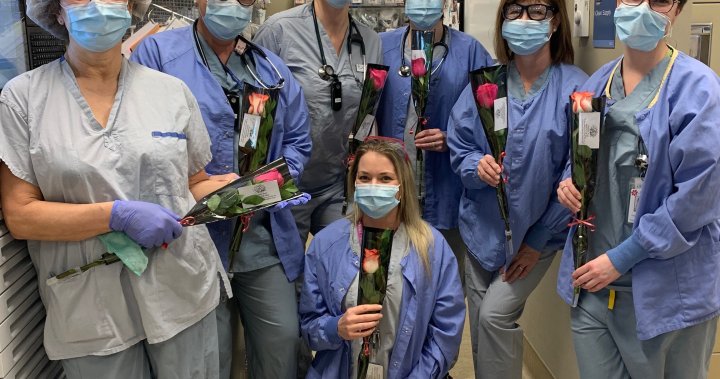 Coronavirus: Nurses at B.C. hospital thanked for work during pandemic, given single rose each